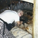 Helen Kagin Touching Birthplace of the Baby Jesus in Bethlehem