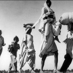 Old-sikh-man-carrying-wife1947