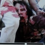 An image from a mobile phone apparently showing Col Muammar Gaddafi wounded. Origin unknown.