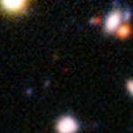 The red speck at the centre of this very deep image from the ESO Very Large Telescope shows the galaxy NTTDF-474, seen when the Universe was only 820 million years old. It is one of the most distant ever to have had its distance measured accurately, and is one of five that have been used to chart the timeline of the reionisation of the Universe about 13 billion years ago. Image: ESO/ L. Pentericci.