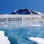 The blue ice covering the lake comes from glacial meltwater from the Canada Glacier and other smaller glaciers. The fresh water stays on top of the lake and freezes, sealing in briny water below.