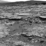 The sinuous rock feature in the lower center of this mosaic of images recorded by the NASA Mars rover Curiosity is called "Snake River." Image taken Dec. 20, 2012.
CREDIT: NASA/JPL-Caltech