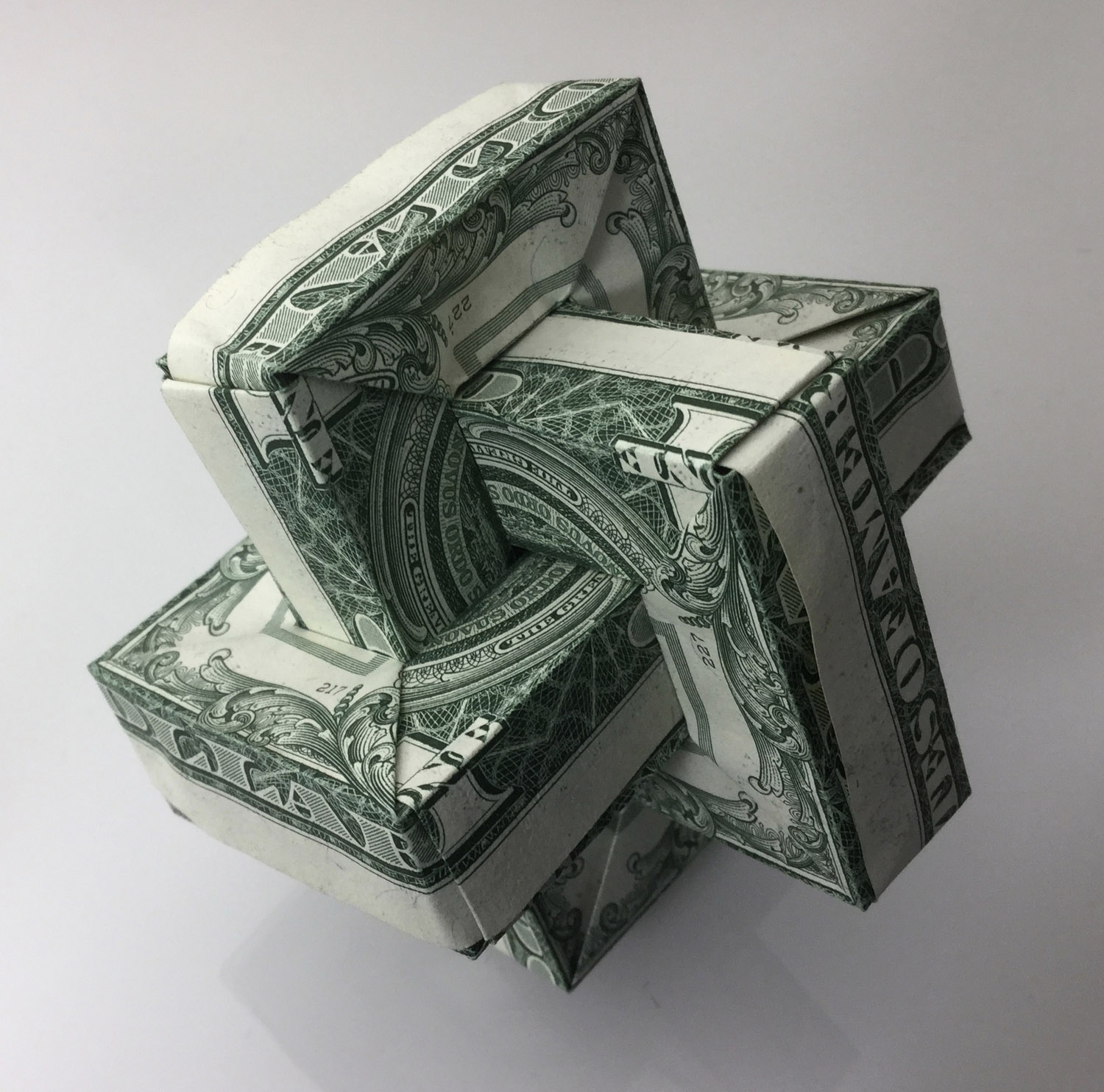 step by step dollar bill origami instructions