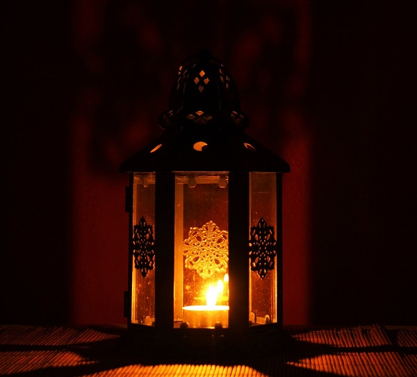 A lantern glowing in the dark