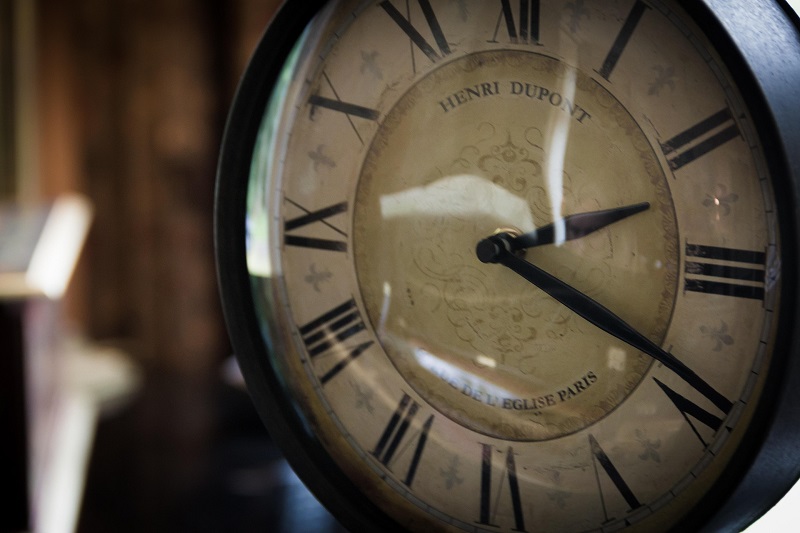 An antique analog clock face
