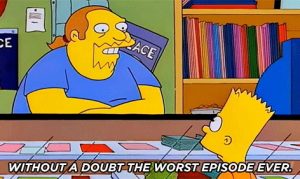 A screenshot of The Simpsons in which Comic Book Guy stands behind his shop counter telling Bart "Without a doubt the worst episode ever"