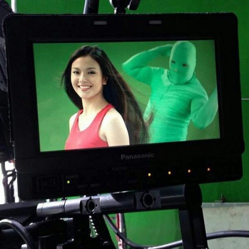 Green ninjas help shampoo and hair dye commercial actresses do their hair swing. 