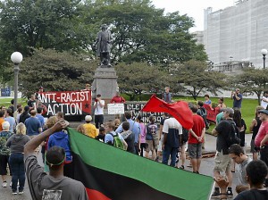 About four dozen people showed near the Judicial Building at the State Capitol complex in St. Paul to counter protest individuals who had planned on holding a rally in defense of the Confederate Flag on Saturday, September 5, 2015.  The Confederate Flag rally organizer BC Johnson, who had intended to rally at the State Capitol said the event was relocated to Savage Community Park. He estimates 10 people showed up. (Pioneer Press: John Autey)
