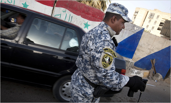 Iraqi Police officer with bomb dowsing rod